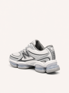 NEW BALANCE 1906 BLANCA PLATEADA