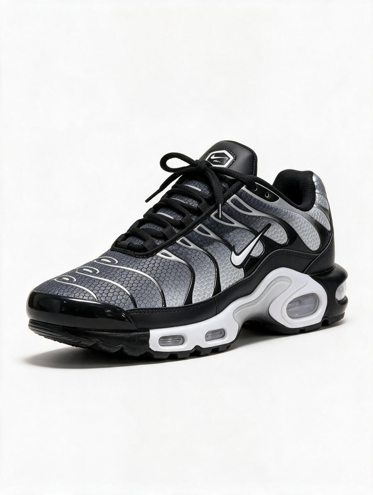 NIKE TN PLATEADA GRIS