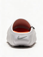 NIKE CALM SLIDE CHANCLA GRIS