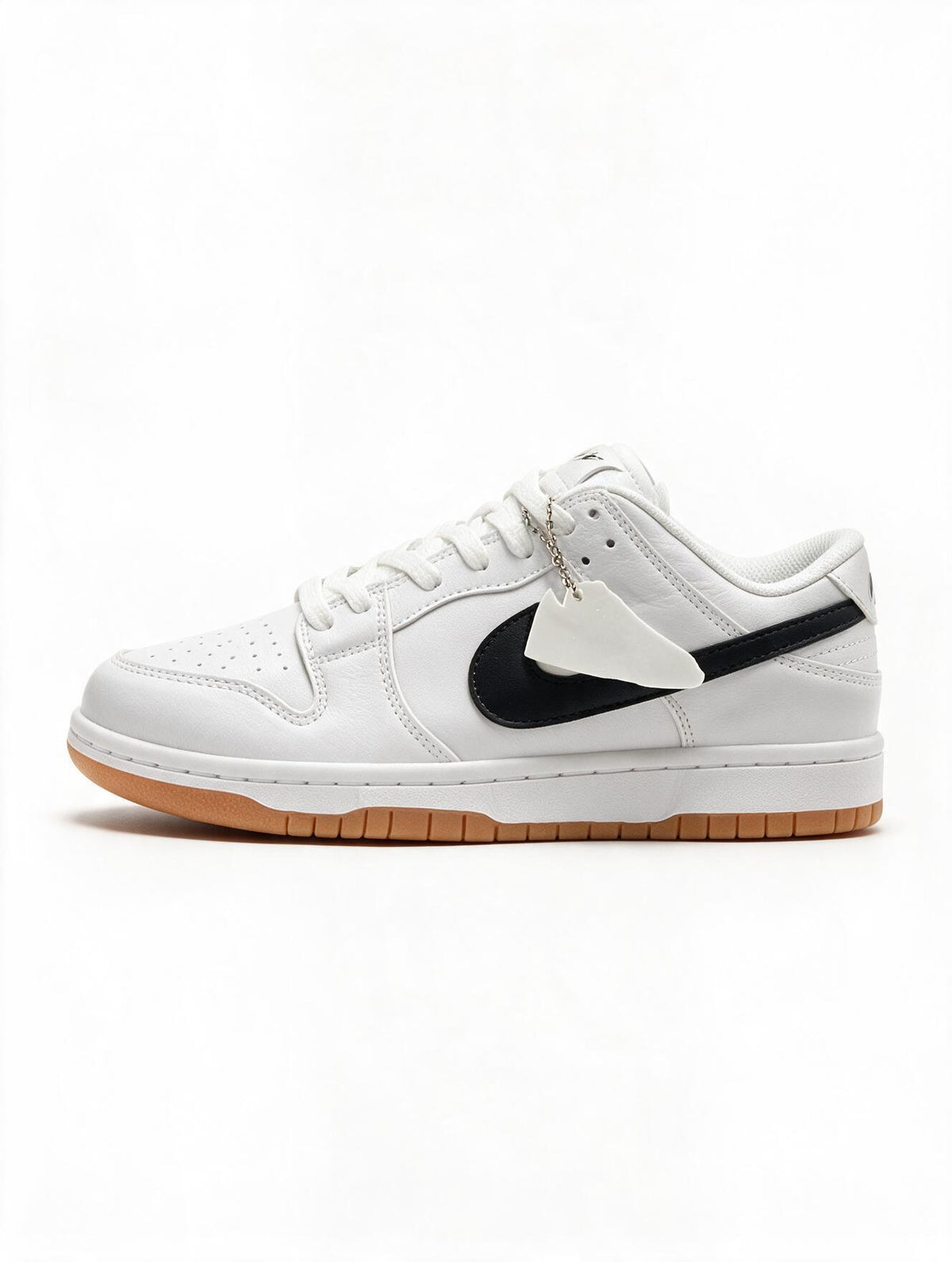 NIKE DUNK LOW BLANCA NEGRA SUELA GOMA