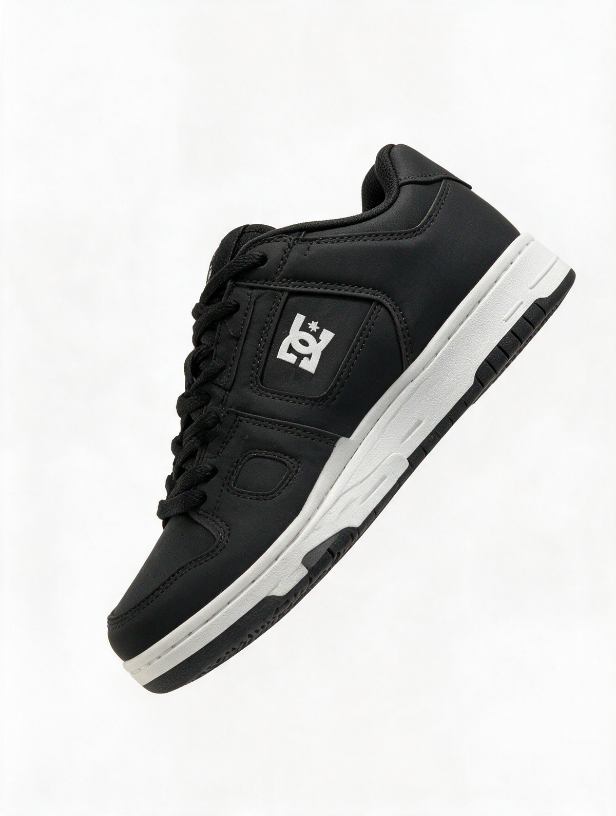 DC SHOES NEGRA SUELA BLANCA