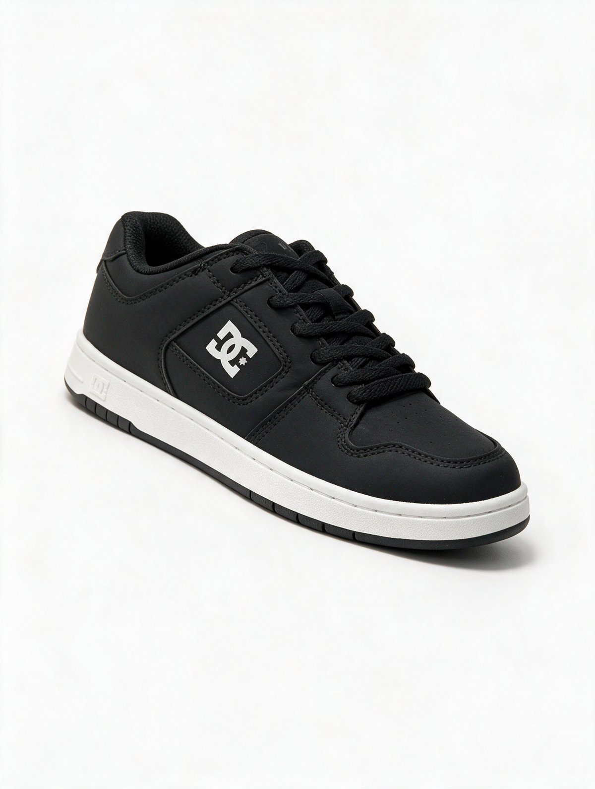 DC SHOES NEGRA SUELA BLANCA